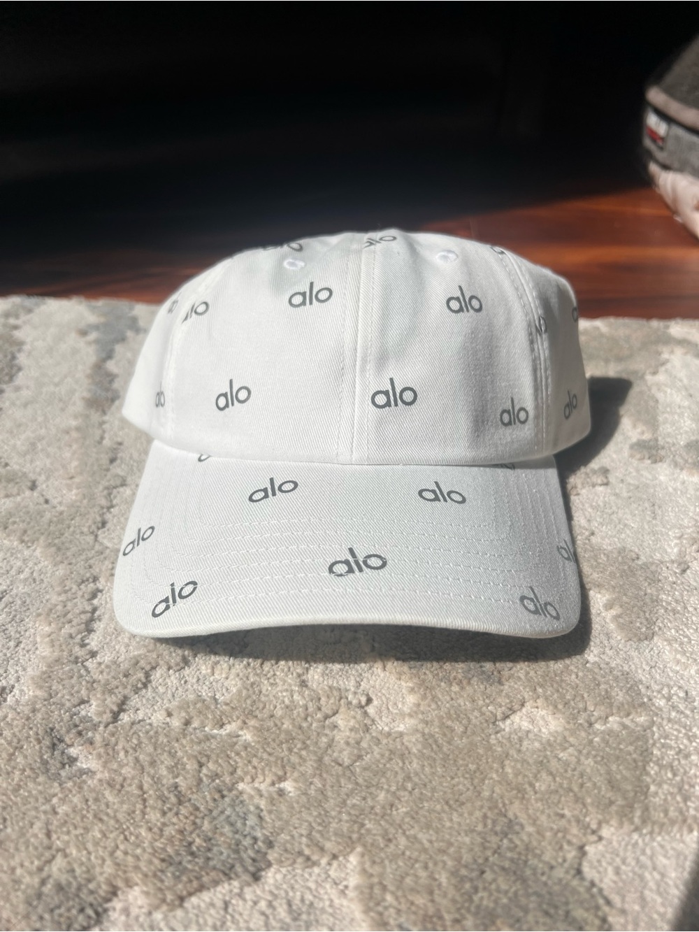 ALO Yoga White Cap with Allover Silver Reflective Logo